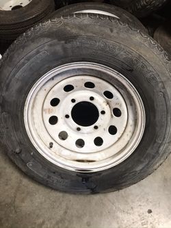 One used ST 205x75-15 with 6 lugs rim $40