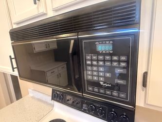 Black Refrigerator, Black Microwave, Stove, and Dishwasher for sale