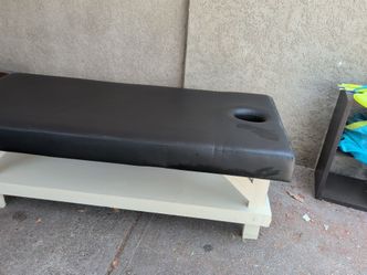 Massage table