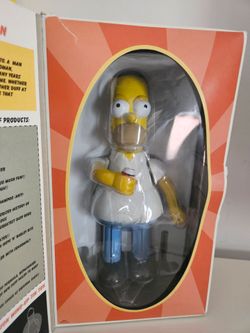 2002 Homer Simpson tin wind-up toy – collectible item
