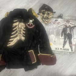 Rubie’s Child Costume USA Lrg 12/14 Sea Plague Irate. See pics. Costume includes jacket w/ attached molded shirt & vinyl mask. Black gloves & sword a