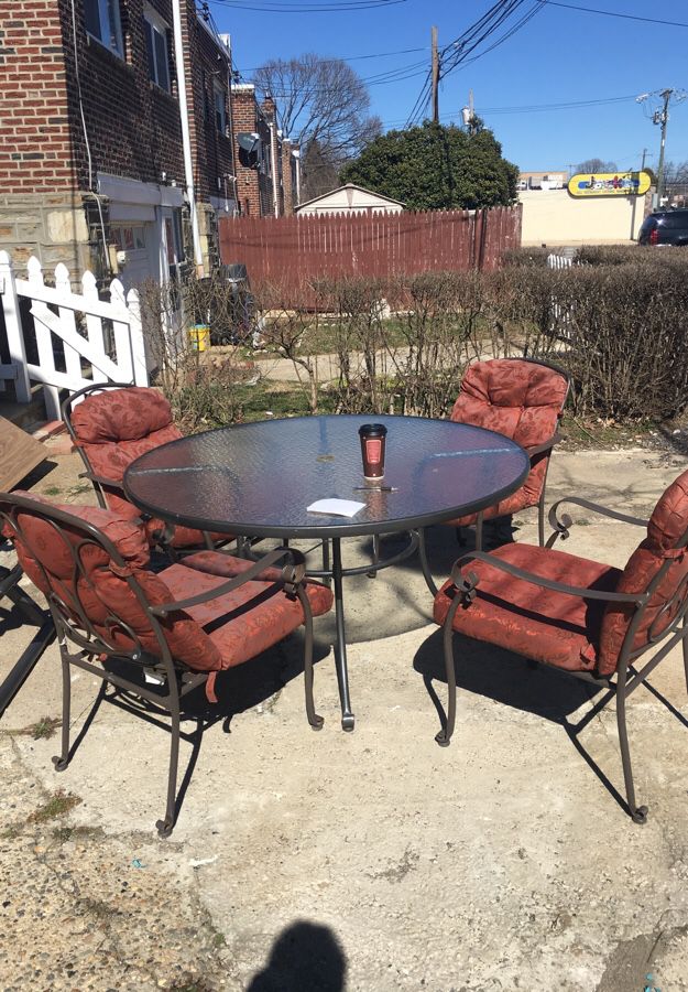 Patio dining table and four (4) chairs ...((without the cushions))..