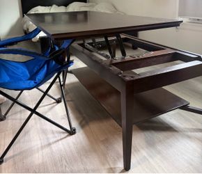Rising/ adjustable coffee table