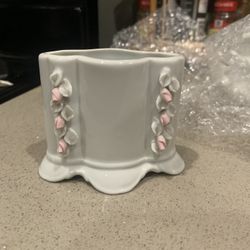 vintage white porcelain vase or planter