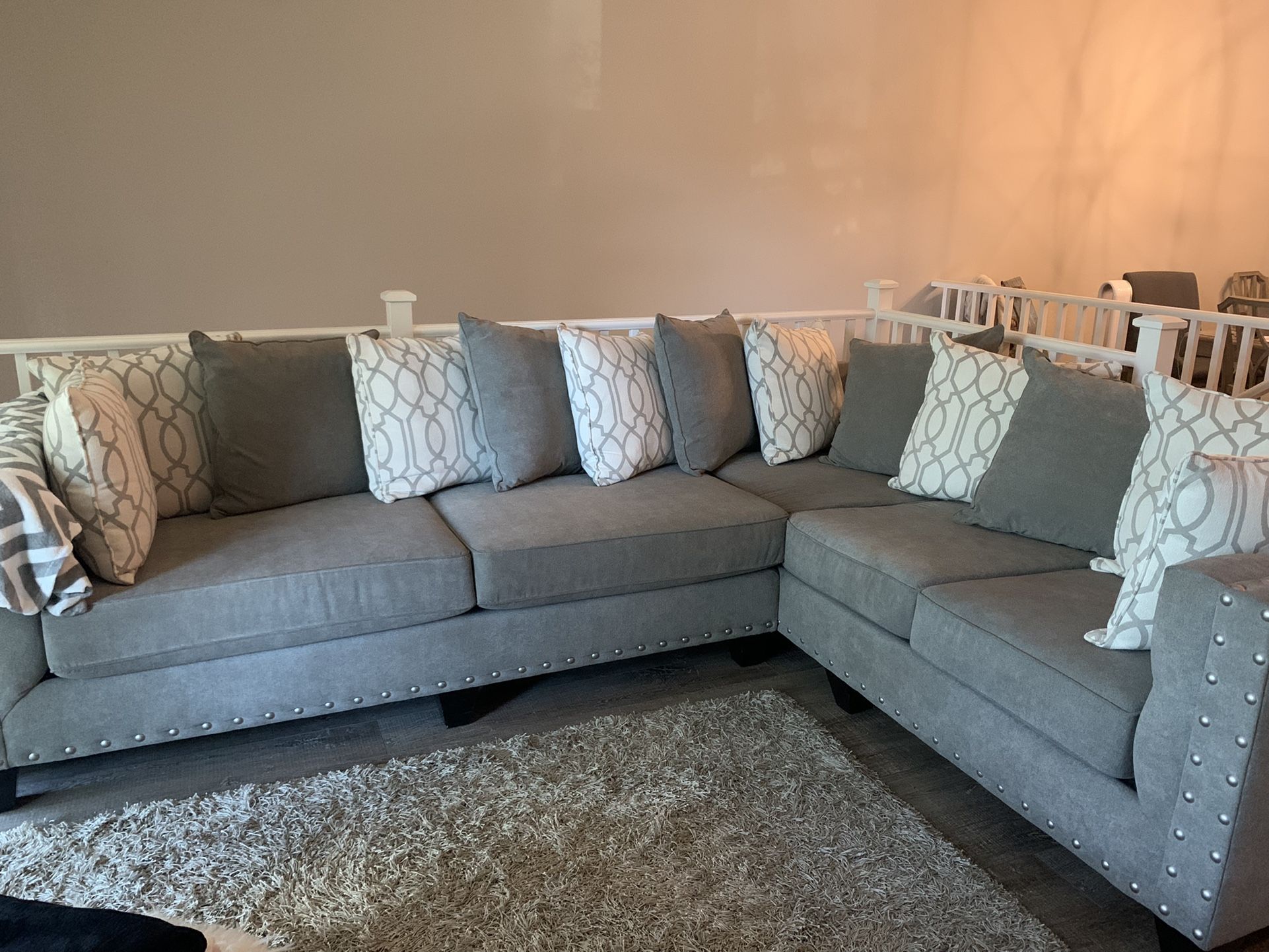 Gray  Family Couch with White/ Grey Pillows 