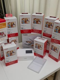 Canon Selphy CP-1500 Photo Printer + 12 Boxes of Prints