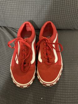 Red Vans with Checkers on the sideline