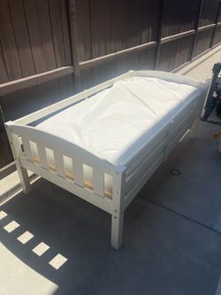 Free single bed frame with bed.