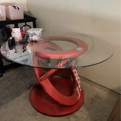 Glass red round glass table (pick up in Round Rock) 