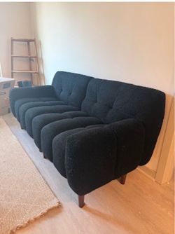 Black fabric couch wood legs tall