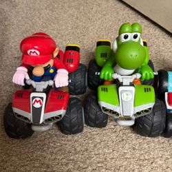 Yoshi And Mario Cart Work Good But The Other Mario Doesn’t Function All Come With Remote All For 40 For Three Cars Then The Two Luigi Different prices