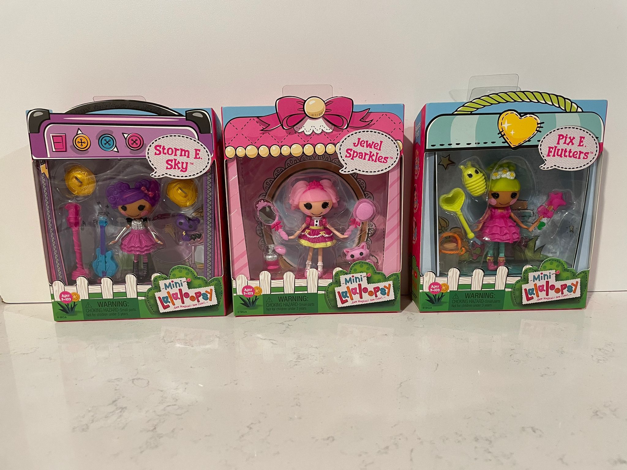 4 Mini Lalaloopsy Dolls 2 Pix E. Flutters, 1 Jewel Sparkles, and 1 Storm E. Sky