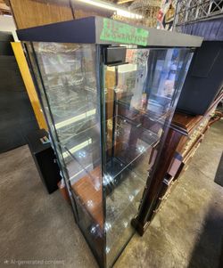 Two All glass curio with 4 shelves each $85 ea.
16.5"w x 14.5"d x 64.25"h