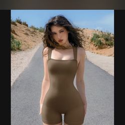 Brown one piece size S