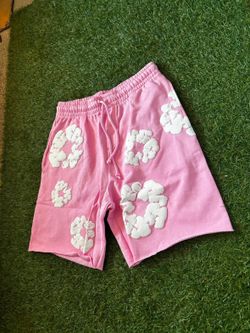 Pink denim tear shorts