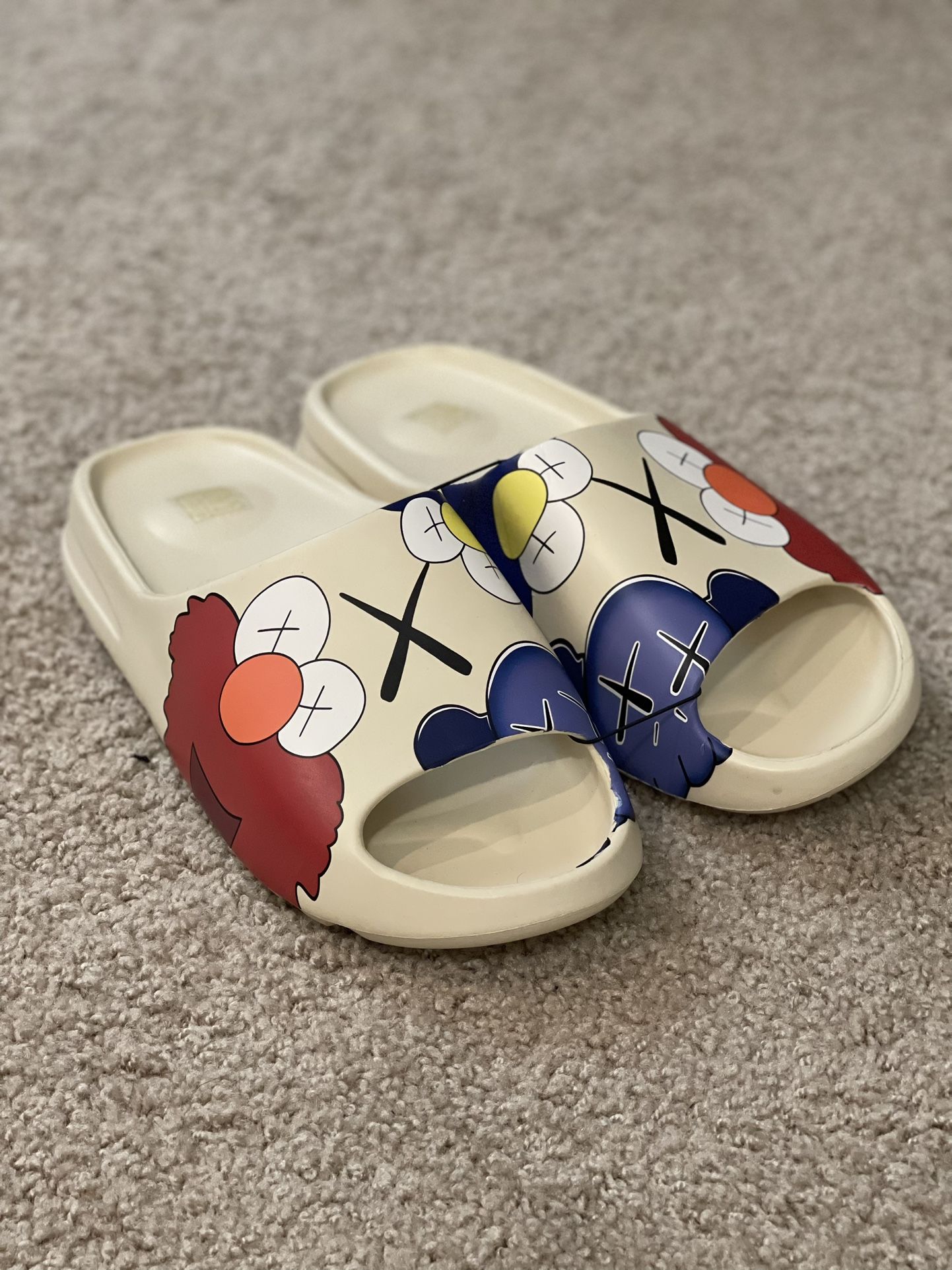 Kaws flip flops hotsell