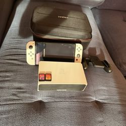 Nintendo Switch Oled With Pokemon And Mario Kart 8