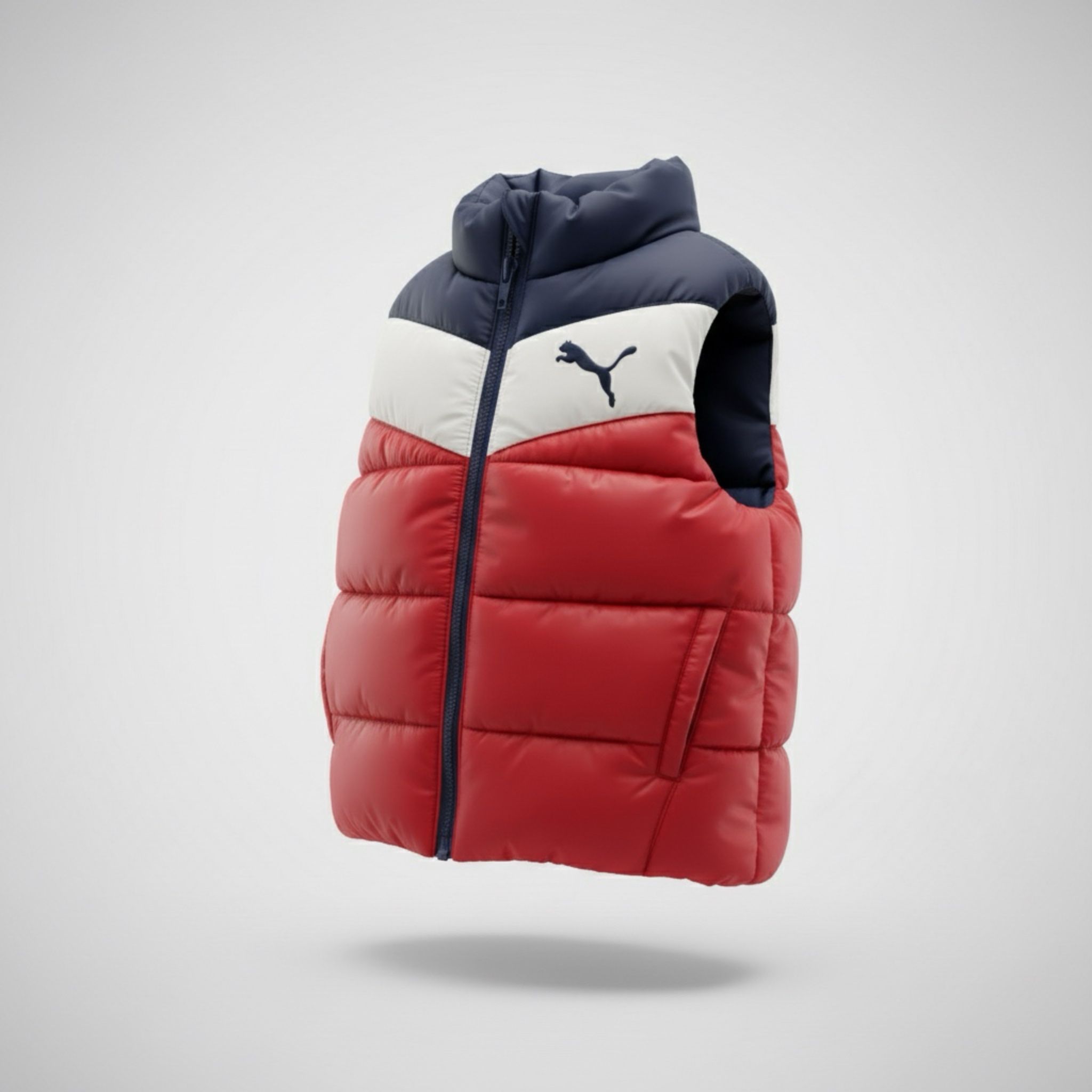 PUMA 2T puffer (navy + red trim). Cozy, lightweight, and ready for playground rescues, cookie runs, and dramatic leaf-jumping. Gently used; no holes,