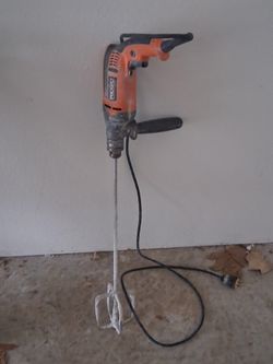 Rigid mixer with mixing paddle