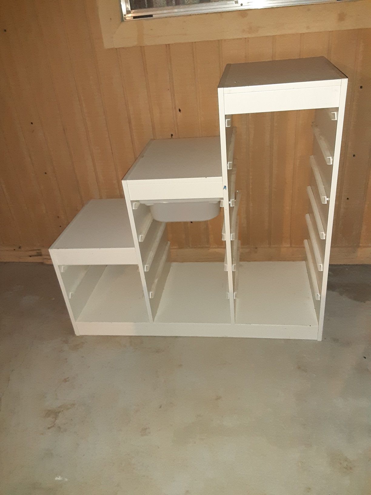 White stair like stand (as it)