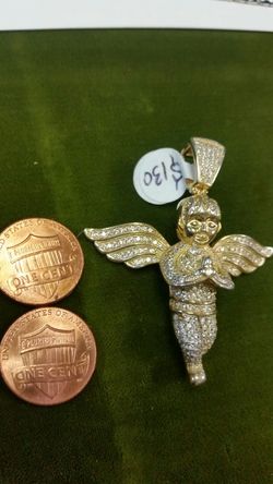Sterling silver. 925. Gold over.... silverAngel