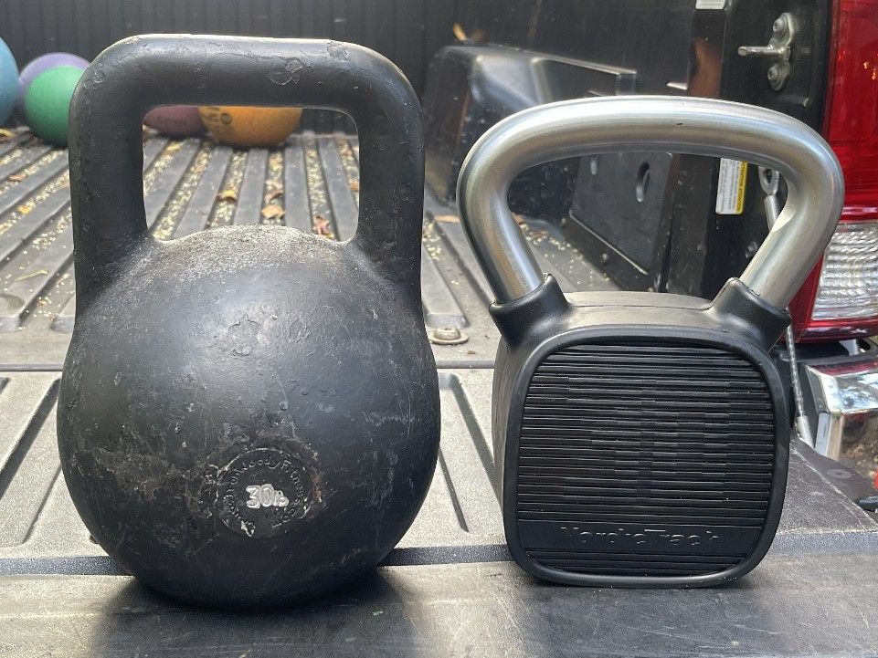 PAIR OF 30 LB. KETTLEBELLS = NORDIC TRACK RUBBER 30 = $50 & LARGE COMPETITIVE. STYLE 30 = $50