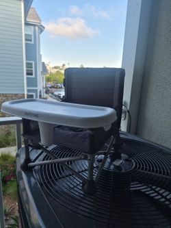 Portable high chair.