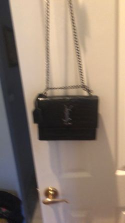 YSL Embossed Leather https://offerup.com/redirect/?o=QmFnLk5ldw==