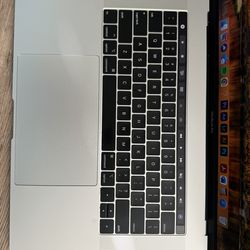 15 inch MacBook Pro - 500 mg with Touch Bar and thumb print