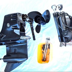 OMC Cobra 3.0L Outdrive, tilt pump, prop, attachment hardware, and tilt cylinders as pictured...