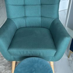 Green armchair with ottoman
