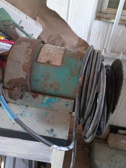 Old Electric Motor with Pulley and Cable