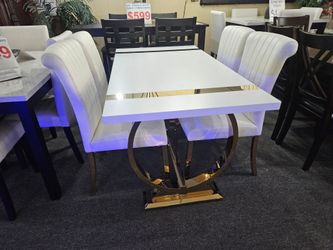 Brand new white faux marble dining table with gold base (60"×42"×30") + 4 white linen chairs