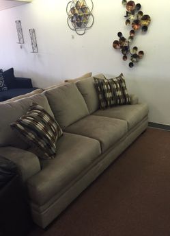 Grey Serta sofa and loveseat