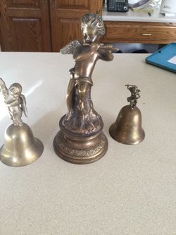 Beautiful vintage copper statue with to bell ringers from India