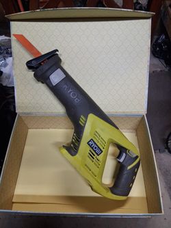 A Ryobi Brand Yellow Green and Black Recipricating Saw