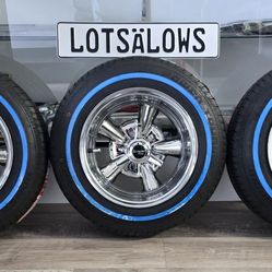 Brand new chrome 13x7 reverse Supreme lowrider wheels in whitewall tires
