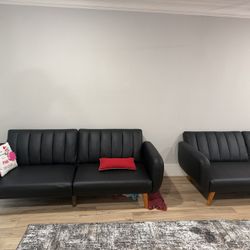 2 Faux Leather Sofas
