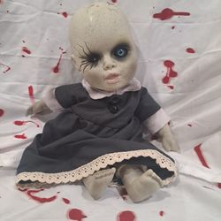 Small Creepy Doll With Sound Effect 