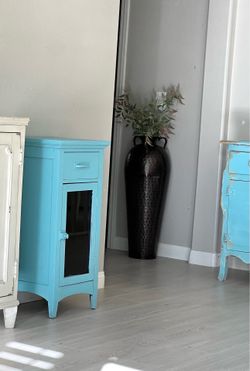 Charming cabinet with shelves and drawer