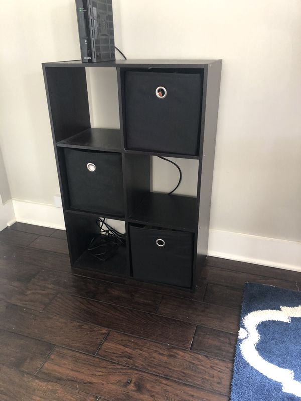 Small black cube storage shelf holds 11x11 cubes for Sale in