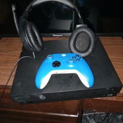 xbox one x with controller and headset 