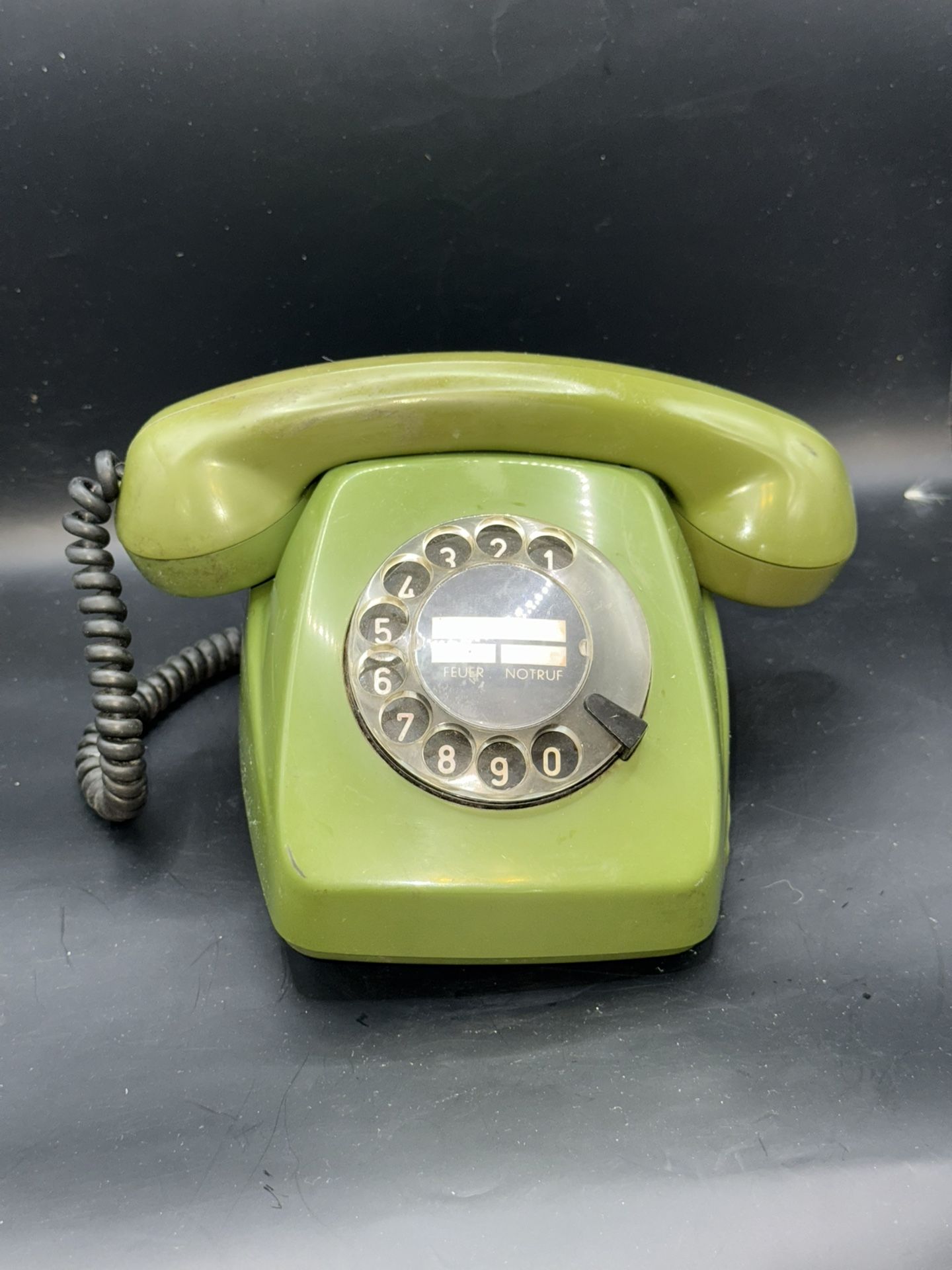 The retro rotary phone by Siemens is a vintage desk telephone manufactured in Germany