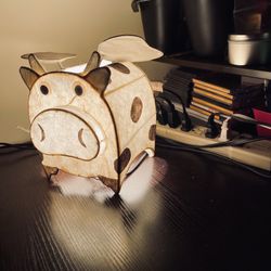 Flying Cow Night Light. Fancy and funny. Wings are mobile. Loved by children and adults. Great condition. Bargain price. 