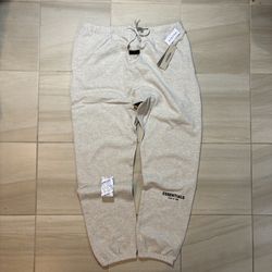 Fear of god essentials light oatmeal pants
