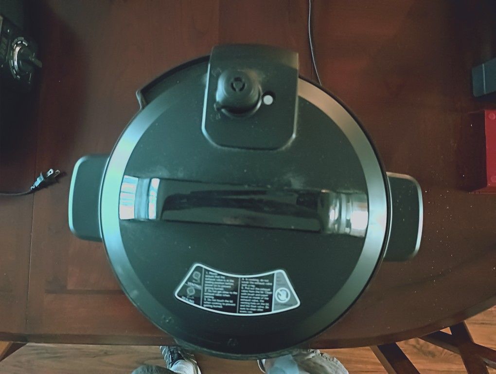 Insignia Pressure Cooker With Removable Dishwasher Safe insert.