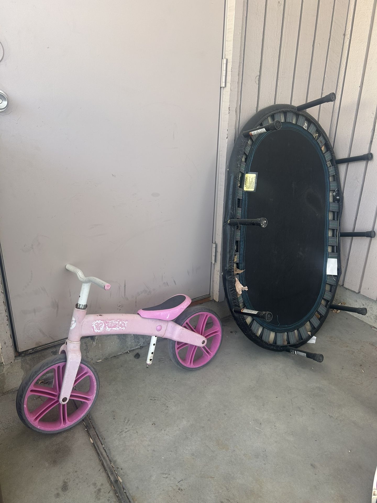 Balance Bike And Small Trampoline