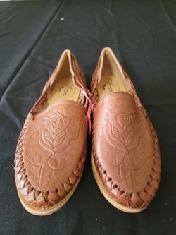 women's handmade leather huarache sandals with a rose stamped design