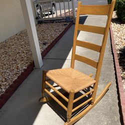 Antique Wooden Rocking Chair With Ladder Back And Woven Seat Bottom