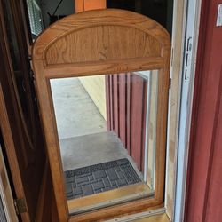 Quality wood framed mirror, 4' 5" tall. 2'5" wide